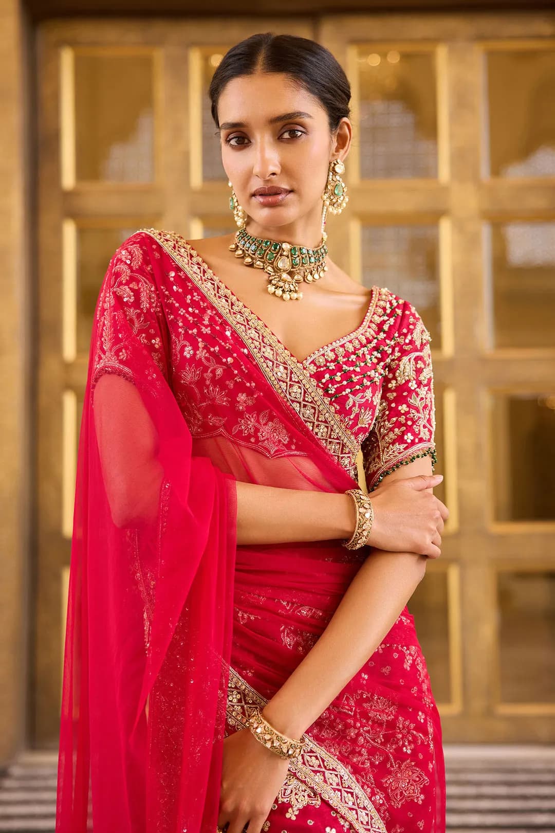 Silk printed embroidered skirt and blouse paired with net dupatta